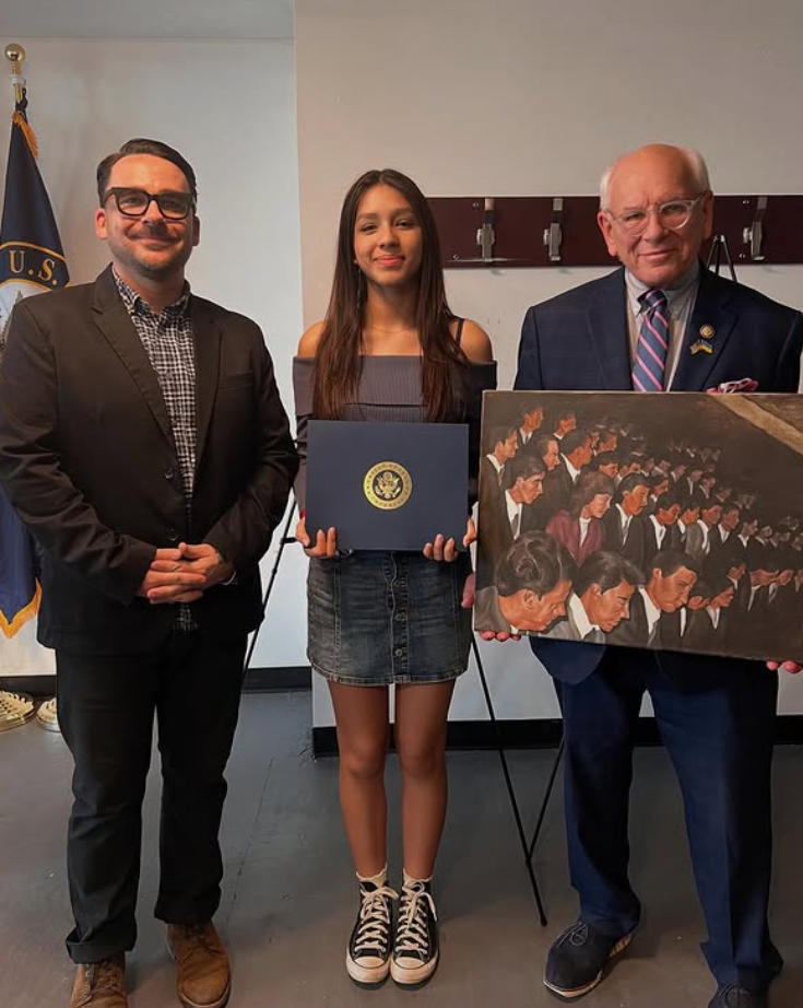 Lesly Garcia was selected as the 2025 Congressional Art Award Winner. She is joined by New York Congressman Paul Tanko, right, and